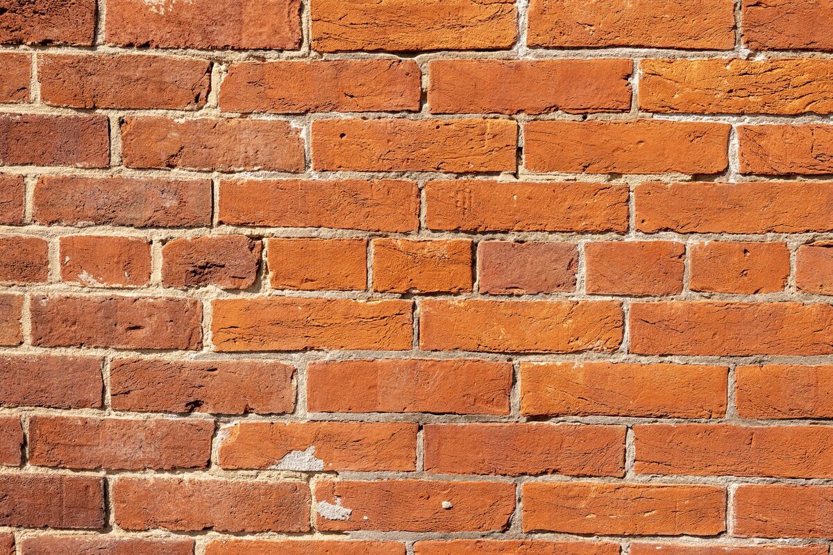 Close-up of traditional lime mortar in heritage brickwork
